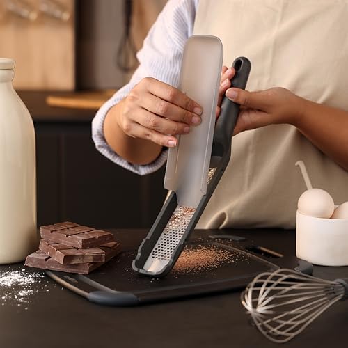 Zyliss Rasp Grater - Handheld Grater with Stainless Steel Blade & Wheat Straw Handle - Ideal for Hard Cheese, Chocolate, Ginger, & More - Protective Cover Doubles as Scraper