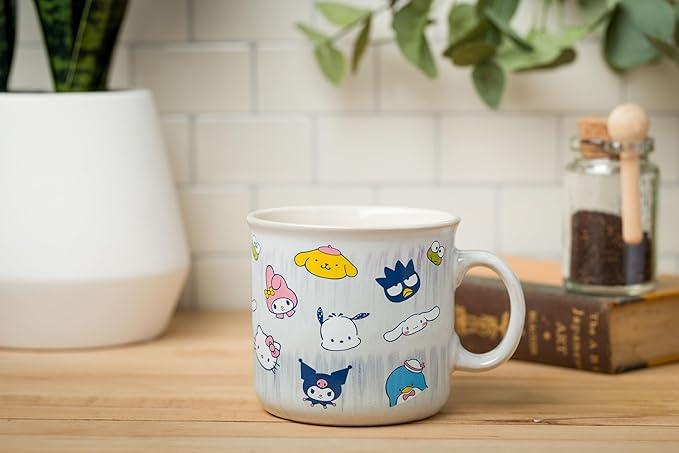 Silver Buffalo Sanrio Hello Kitty and Friends Featuring My Melody, Badtz-Maru, Pochacco, Keroppi, Pompompurin, Cinnamoroll, Kuromi, and Tuxedo Sam Reactive Glaze Ceramic Camper Mug, 20 Ounces