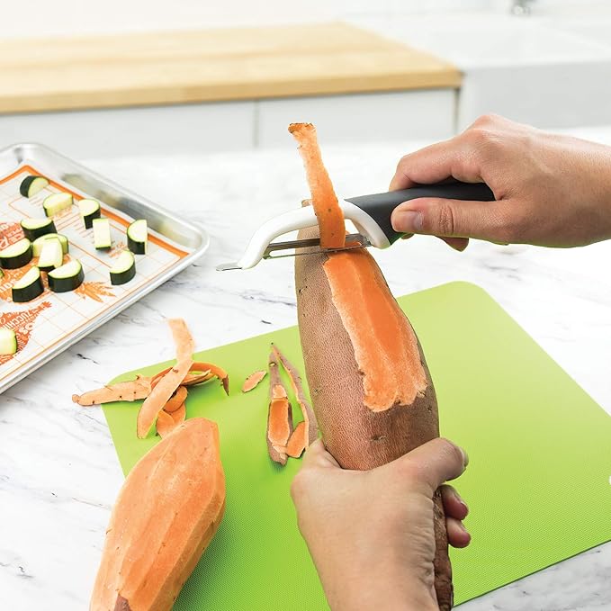Tovolo Potato Peeler for Kitchen Food Prep Wide Swivel Ribbon Vegetable Peeler Extra Sharp Stainless Steel Swivel Blade Non Slip Handle, Dishwasher Safe Peeler with Potato Eye Remover, Charcoal Gray
