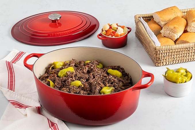 Le Creuset Enameled Cast Iron Signature Oval Dutch Oven, 8 qt., Peche with Light Gold Knob